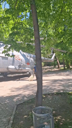 Morning stroll through Almaty park with military displays, rides
