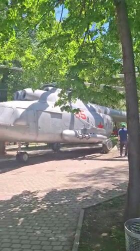 Morning stroll through Almaty park with military displays, rides