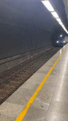 Train arrival and cyclist activity in Belgrade underground station