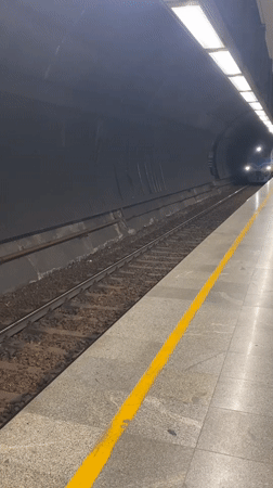 Train arrival and cyclist activity in Belgrade underground station