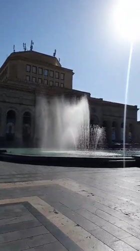 Morning street scenes around a central Yerevan square