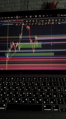 Trading charts and Almaty streetscapes on a September afternoon