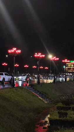 Nighttime Da Lat cityscape captured around illuminated Xuan Huong Lake