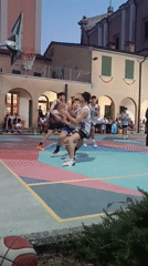 Evening basketball on Viadana's colorful outdoor court
