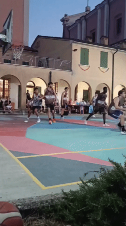 Evening basketball on Viadana's colorful outdoor court