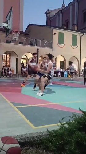 Evening basketball on Viadana's colorful outdoor court