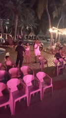 Late-night karaoke performances at Venezuela resort venue