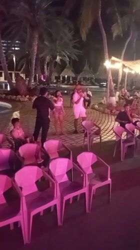 Late-night karaoke performances at Venezuela resort venue