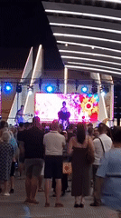 Drag performance and crowds light up Torrevieja's promenade at night