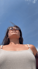 Woman photographed looking skyward in Chaikovsky, Russia