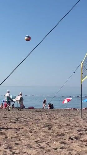 Beach volleyball in full swing on a sunny Boreti morning