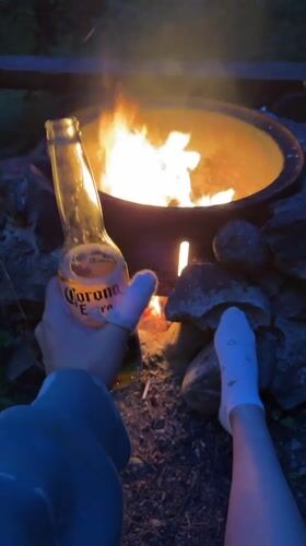 Summer solstice campfire night in a Cheposh pine forest