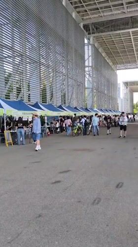 Morning gathering at vendor tents in Daejeon venue