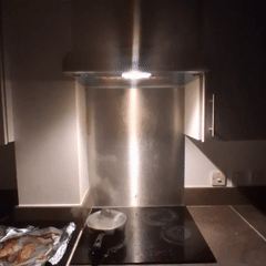 Evening cooking scene captured in Coventry residential kitchen