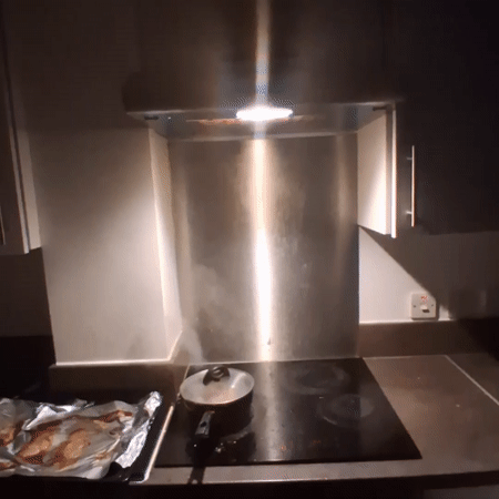 Evening cooking scene captured in Coventry residential kitchen