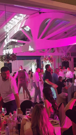 Bulgarian wedding with traditional bagpipes and a sparkler dance