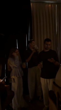 Social gathering documented at Tel Aviv bar with DJ