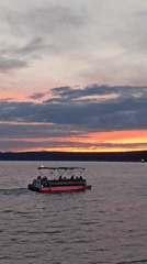 Summer evening along the Votkinsk Reservoir embankment at sunset