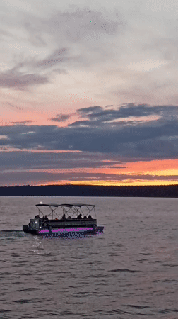 Summer evening along the Votkinsk Reservoir embankment at sunset