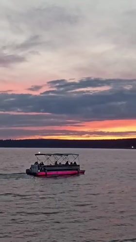 Summer evening along the Votkinsk Reservoir embankment at sunset