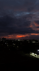Dramatic sunset clouds over Juan Griego at dusk