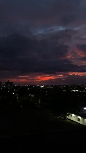 Dramatic sunset clouds over Juan Griego at dusk