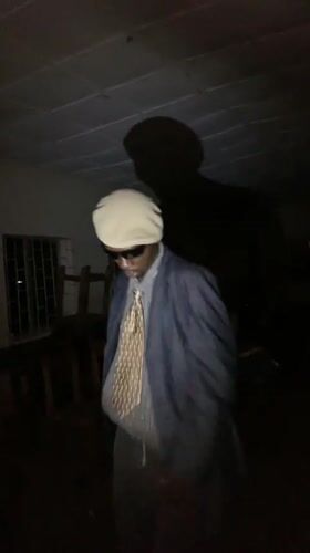 Late-night party vibes and street food prep in Jos