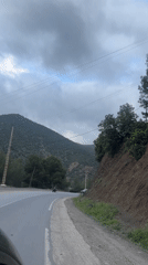 Vehicle journey documented through mountainous Morocco countryside