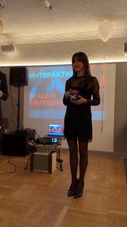 Interactive music game show captured at Moscow party event