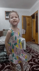 Young girls play and dance in Uzbekistan home