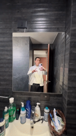 Bathroom mirror selfie, layered casual look, Tlaxcalancingo