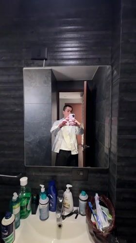 Bathroom mirror selfie, layered casual look, Tlaxcalancingo