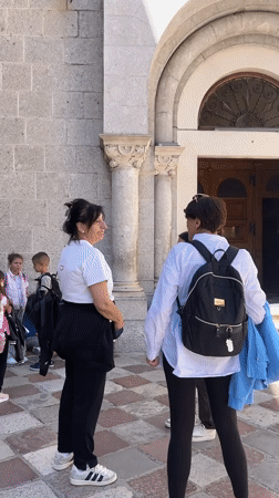 School group visits historic building in Kotor, Montenegro