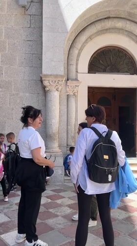 School group visits historic building in Kotor, Montenegro