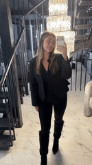Woman takes mirror selfie on Moscow staircase