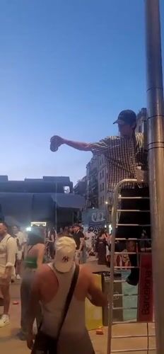 Evening street party with DJ and crowds in Barcelona