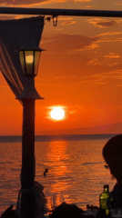 Sunset captured by witnesses along Greek coastline in Sithonia
