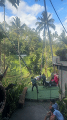 Tourist captures morning view of Tegallalang rice terraces in Bali