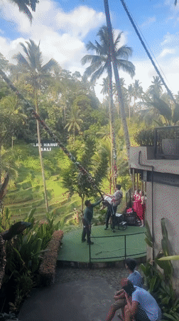 Tourist captures morning view of Tegallalang rice terraces in Bali
