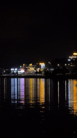 Colorful LED lights illuminate Da Lat waterfront during evening hours