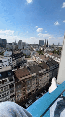 Elevated cityscape view captured in Düsseldorf on clear afternoon