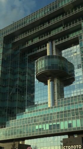 Modern office building with circular feature documented in Moscow
