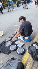 Improvised pot-and-pan drumming on the streets of Klaipėda