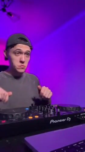 Evening DJ session documented in Khabarovsk apartment setting