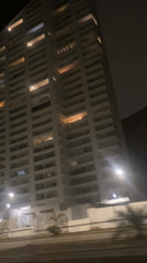 Nighttime view of apartment buildings captured in Arica, Chile