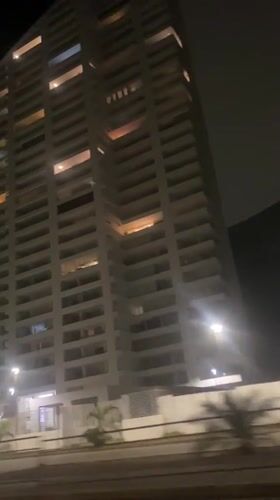 Nighttime view of apartment buildings captured in Arica, Chile