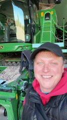 Man Records Agricultural Equipment Selfie Videos in Storage Facilities