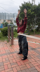 Hula hooping and bar work at a Busan park