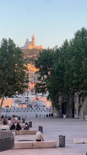 Evening gathering at Marseille's Vieux-Port draws crowds to waterfront square