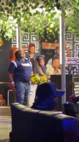 Nighttime poolside party with live music in Guzape, Nigeria